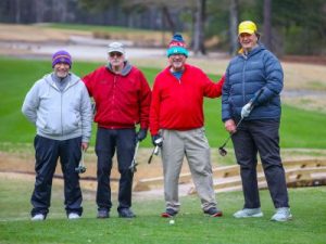 Group of 4 male golfers